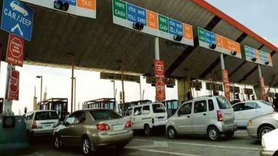 Car using FASTag toll pass for annual highway travel